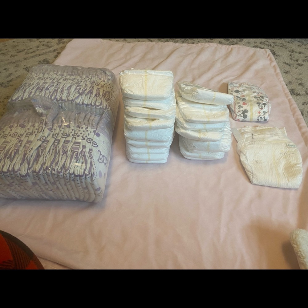 Size one opened diapers